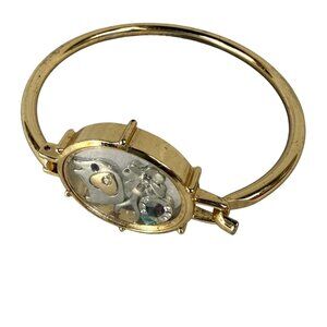Gold-Tone Bangle Bracelet Clear Window & Silver-Tone Charms and Crystal Accents